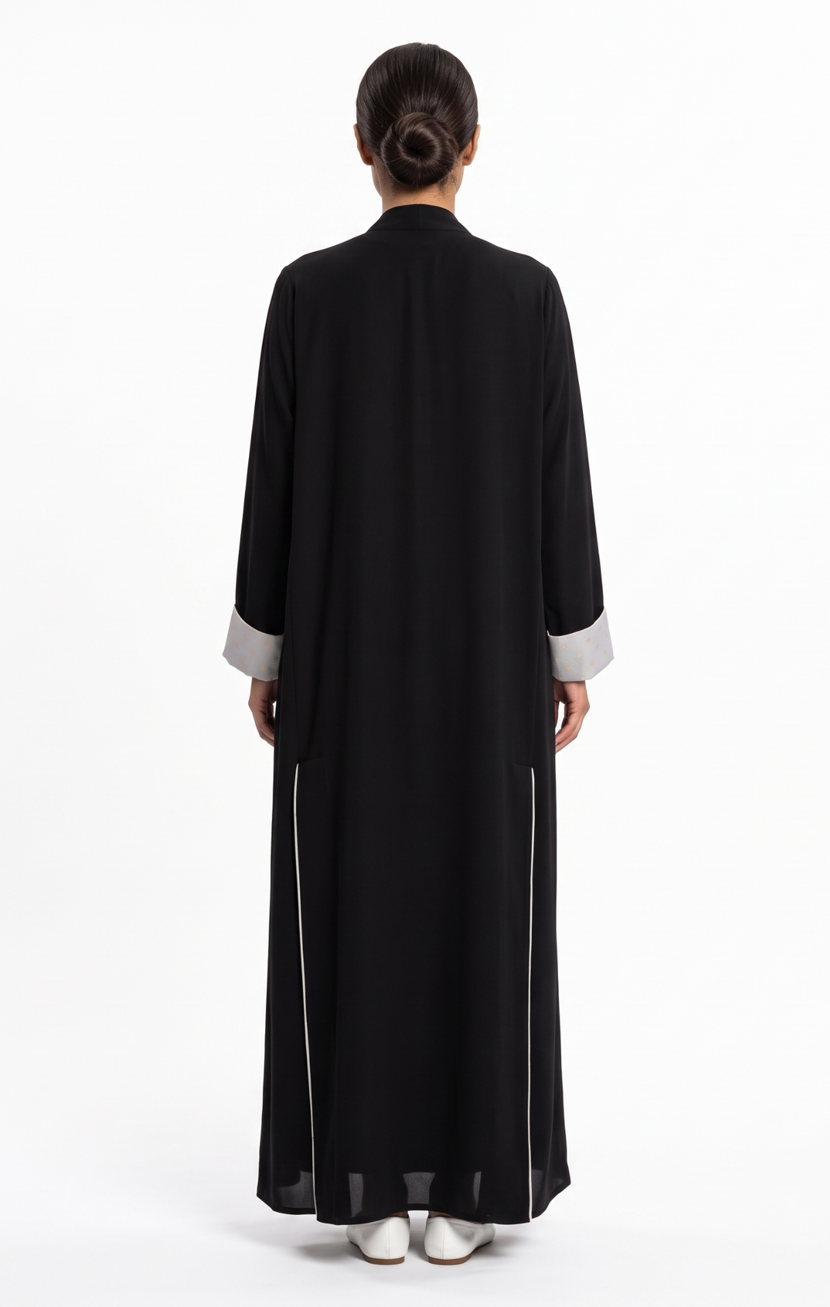 Back view of the black abaya showing the clean silhouette and lined back slit