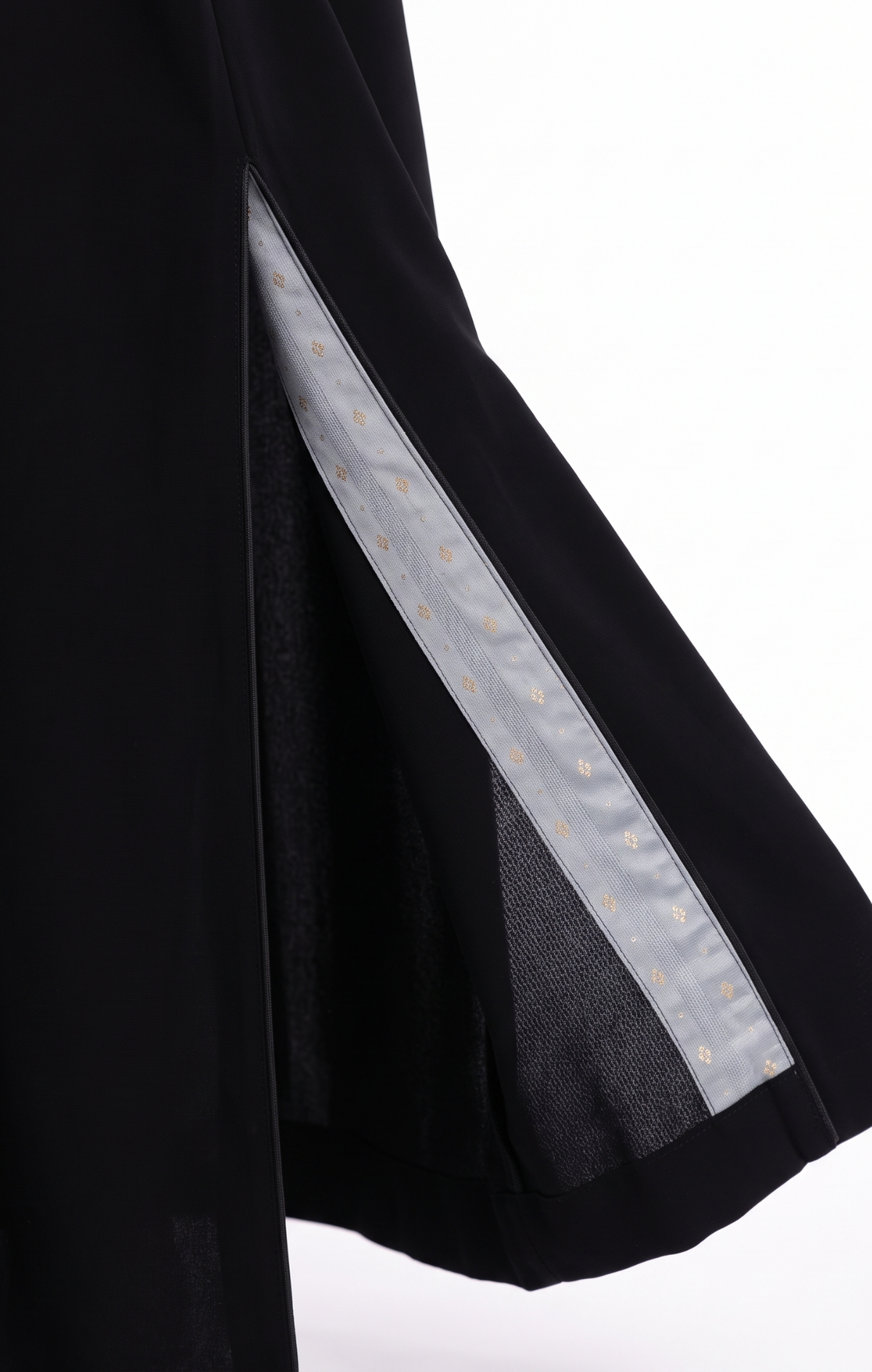 Close-up of the tailored back hem slit lined with the matching patterned fabric