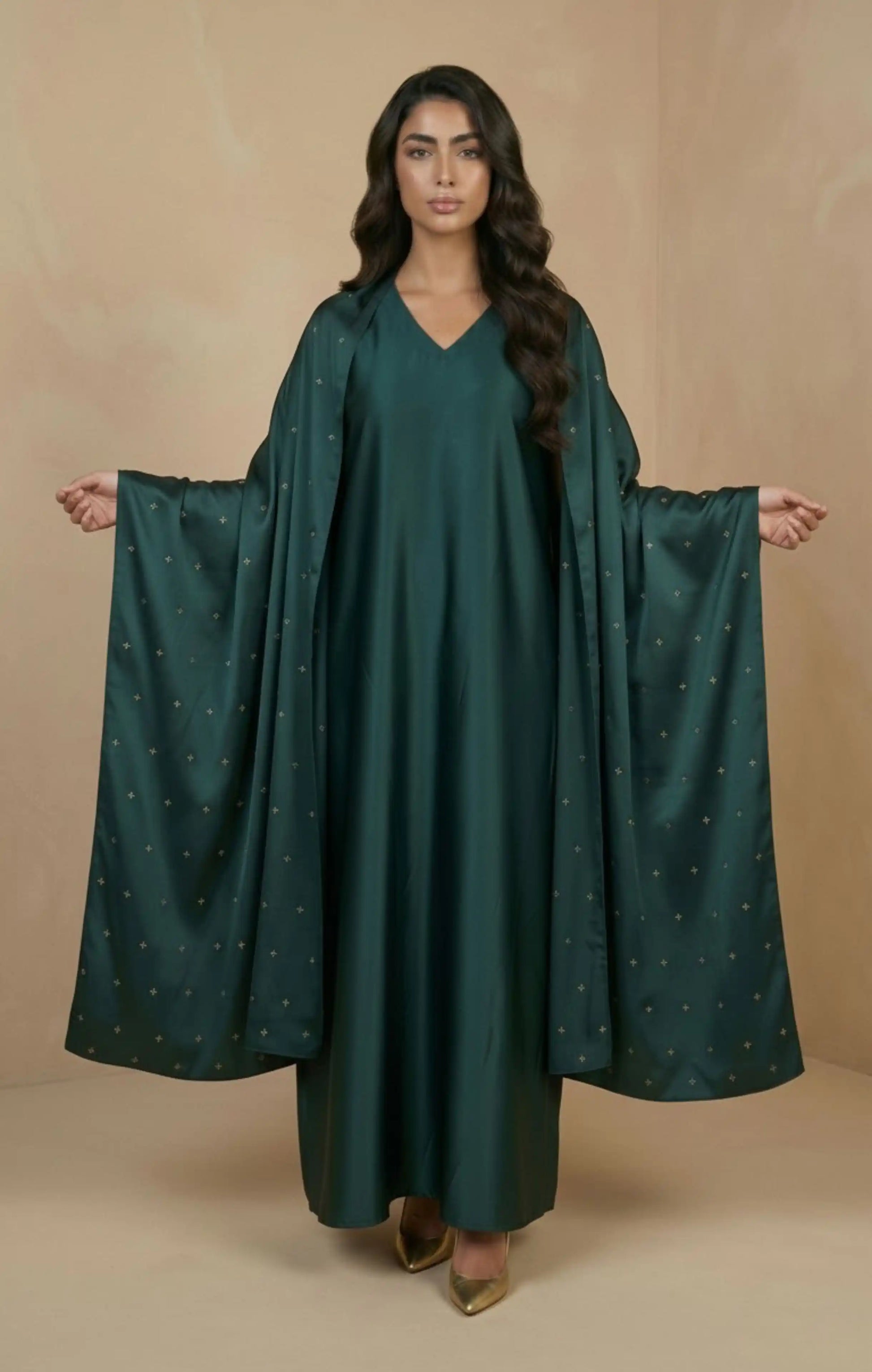 HIRAZ Crafted from luxurious crepe silk, it features a soft, flowing drape  delicate hand embroidery in gold an attached shawl extends from the garment