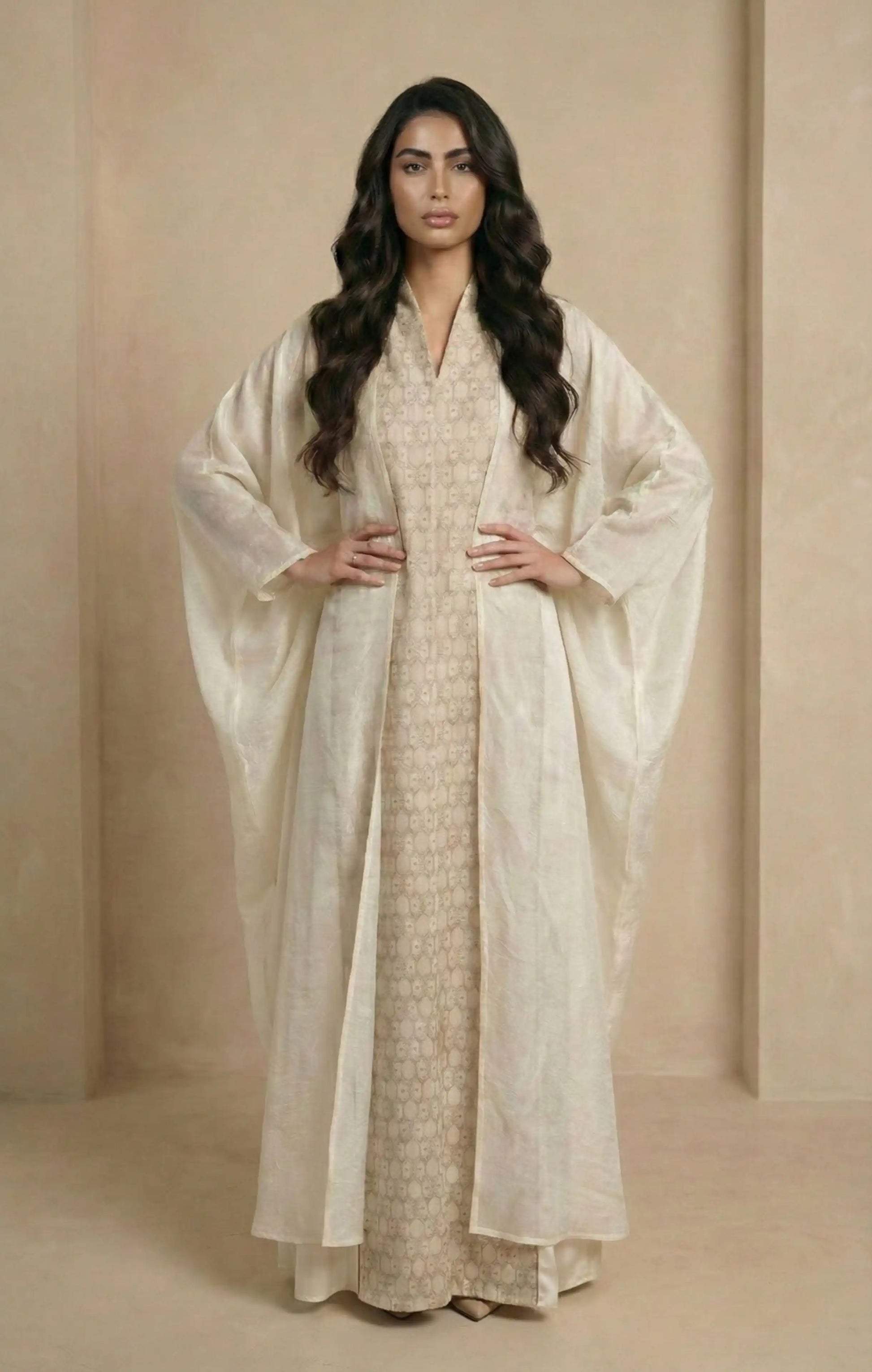 Off-white two-piece kaftan abaya with zari-embroidered silk front panel and cotton back, silk-linen structured drape.