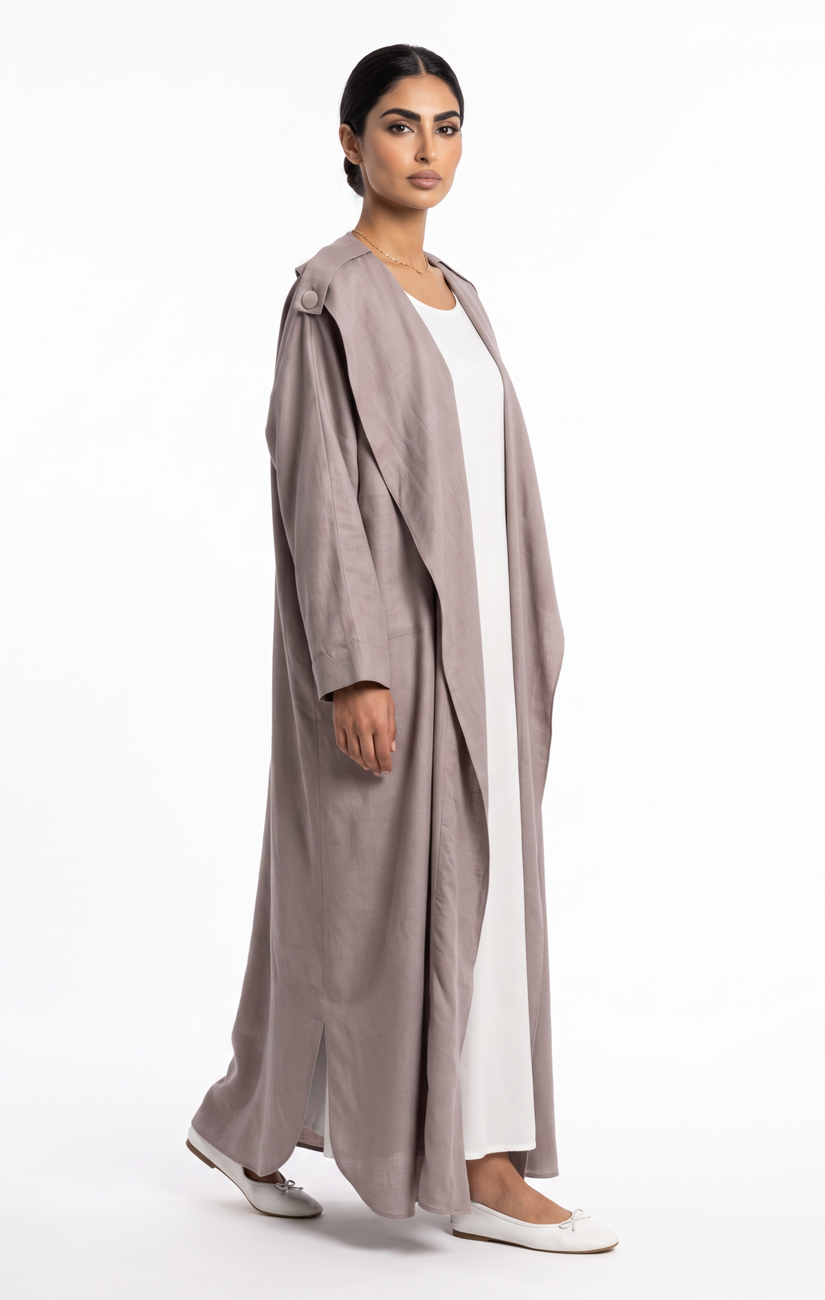 Side view of open-front taupe trench abaya showing subtle side hem slit and fluid draped fabric